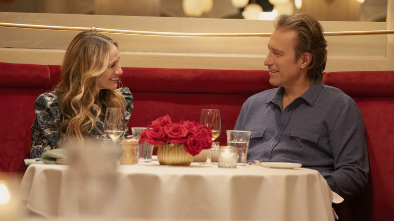 Carrie and Aidan having dinner