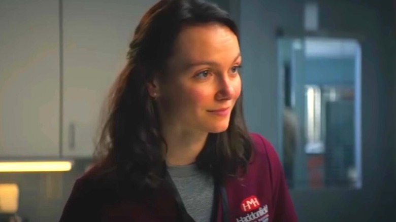 Andi Matichak in nurse's uniform 