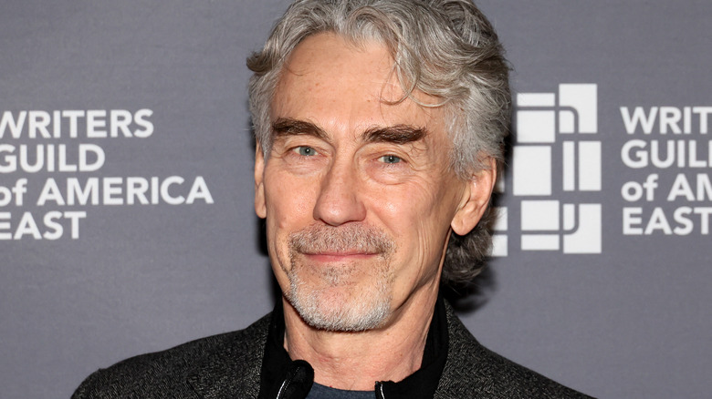 Tony Gilroy smirking