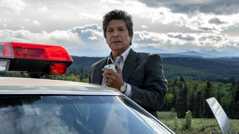 Gil Birmingham speaking into CB radio in "Under the Banner of Heaven"