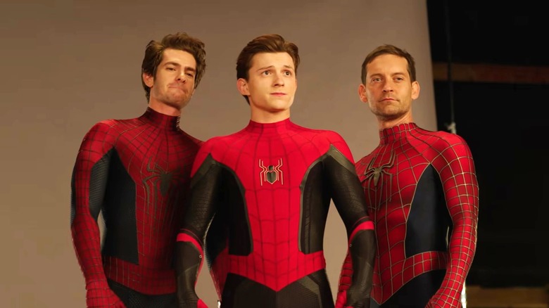 Andrew Garfield, Tom Holland, and Tobey Maguire posing
