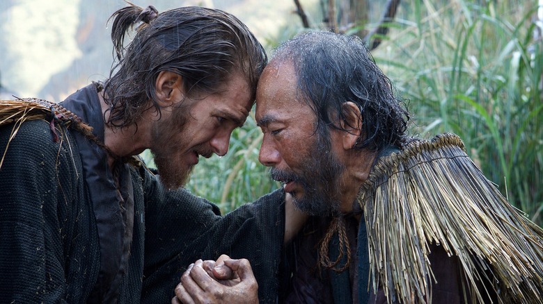 Andrew Garfield praying with friend