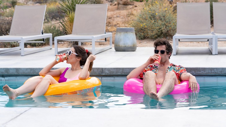 Sarah and Nyles floating in pool in Palm Springs