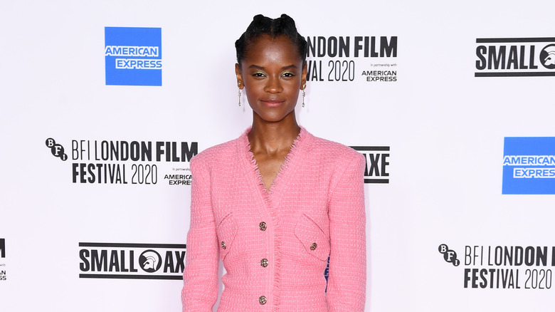 Letitia Wright smiling at event 