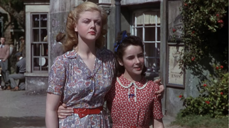 Angela Lansbury and Elizabeth Taylor walking in sundresses