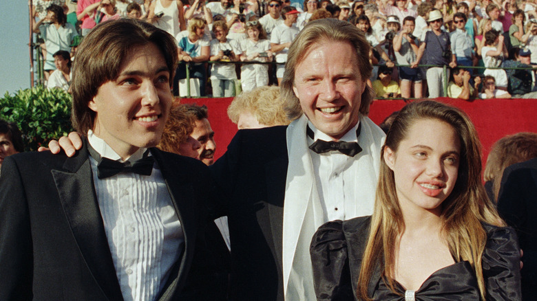 Young Angelina Jolie with her father and brother