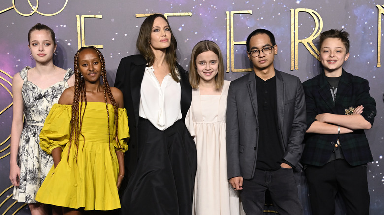 Angelina Jolie poses with her children 