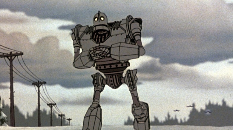 The Iron Giant running through landscape