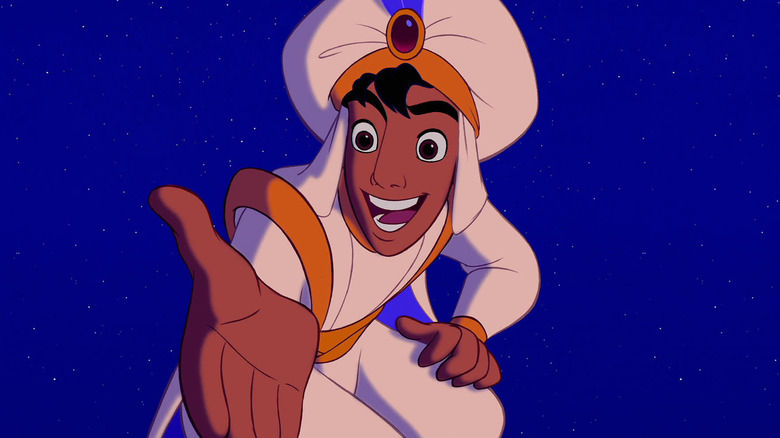 Aladdin reaches out his hand