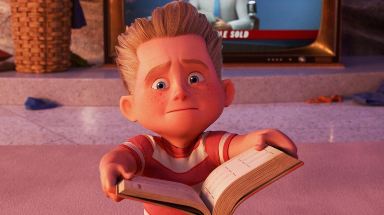 Dash holding a textbook in The Incredibles 2