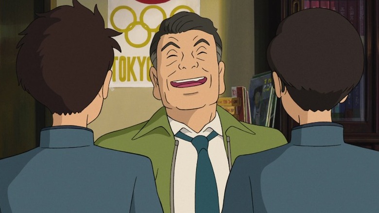 ‌Chairman Tokumaru laughing heartily