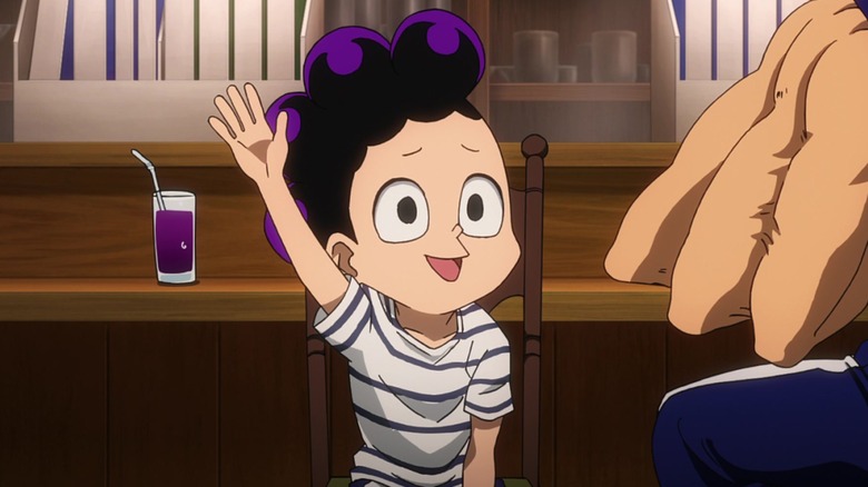 Mineta raising hand with juice