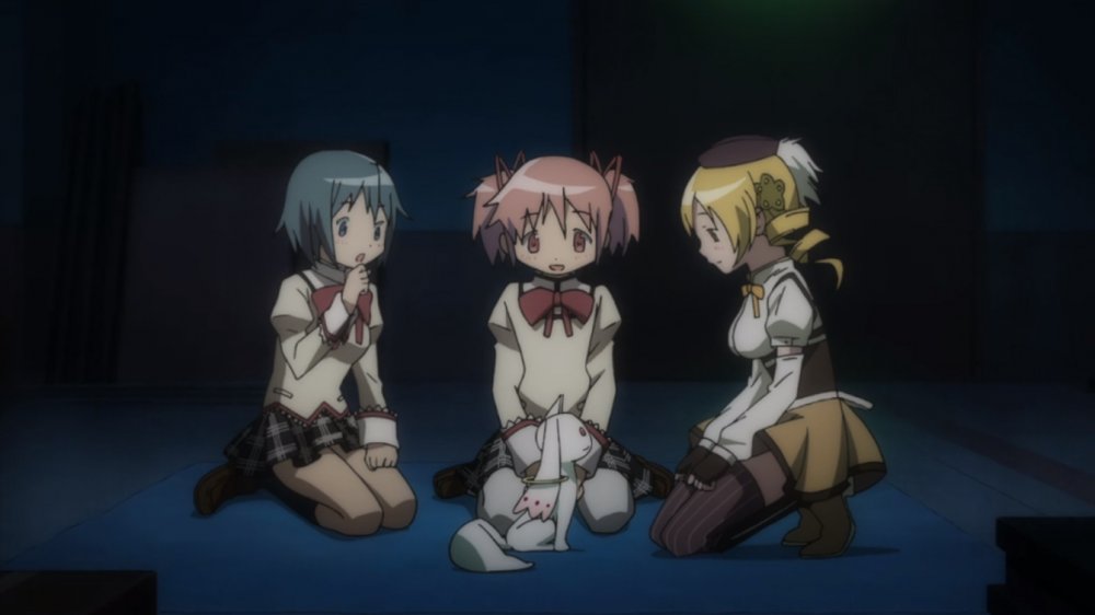 Sayaka Miki, Madoka Kaname, Mami Tomoe, and Kyubey in "Puella Magi Madoka Magica"