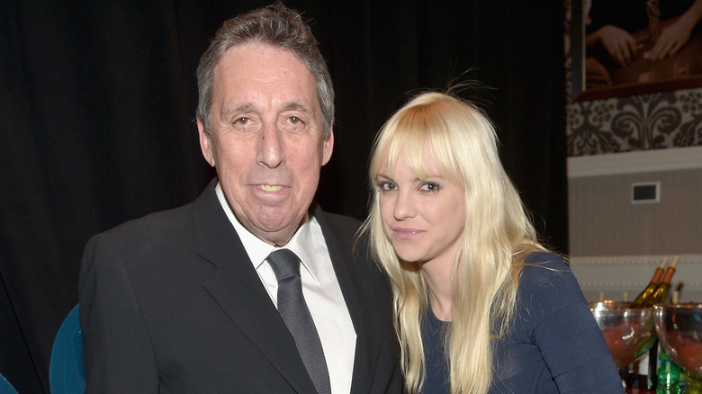 Ivan Reitman and Anna Faris posing together