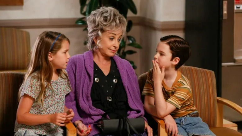 Meemaw sitting with two of her grandkids Missy and Sheldon