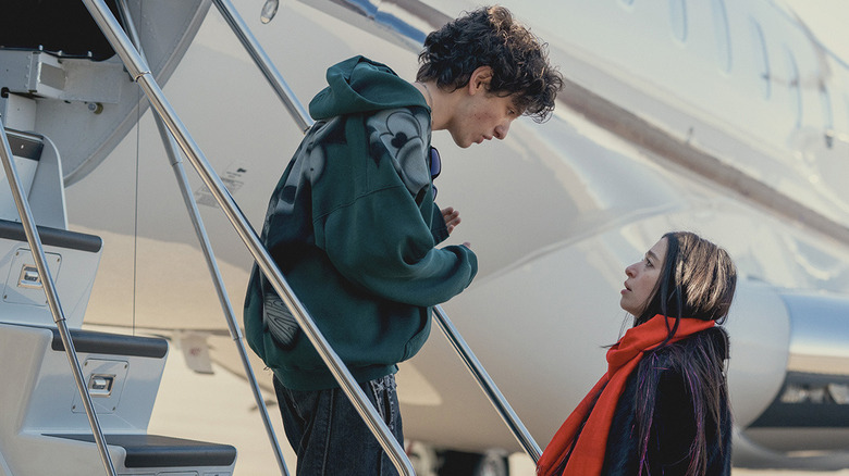 Ani looking up at Vanya on the private jet in Anora