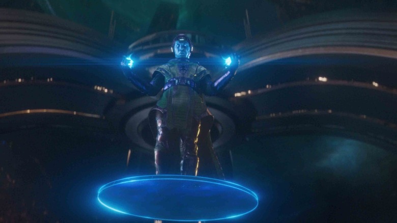 Jonathan Majors hovering in a blue disc as Kang the Conqueror 