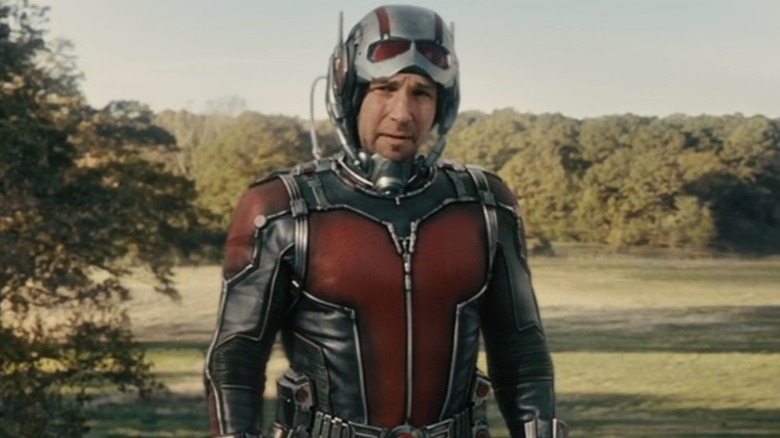 Ant-Man standing outside by tree