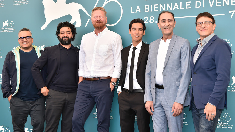 Producers Joe Russo, Mohamed Al Daradji, director Matthew Michael Carnahan, Adam Bessa, Suhail Dabbach and producer Anthony Russo attend Mosul photo call during the 76th Venice Film Festival