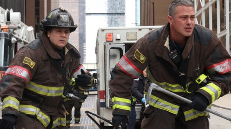 Tony Ferraris and Kelly Severide in firefighting gear