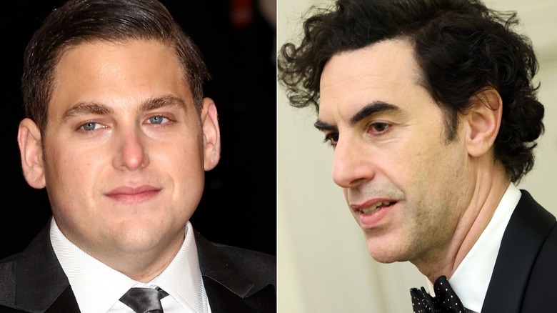 Jonah Hill smiling and Sacha Baron Cohen talking