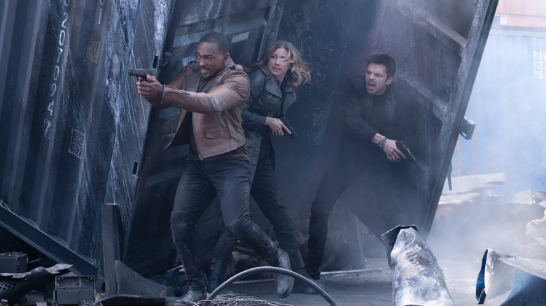 Sam, Sharon, and Bucky wielding guns