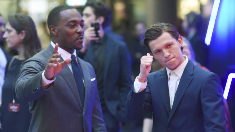 Tom Holland and Anthony Mackie on red carpet