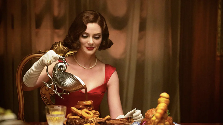 Rita pouring gravy on food in Doom Patrol