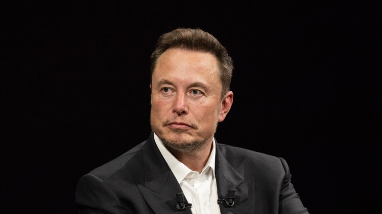 Elon Musk black suit 