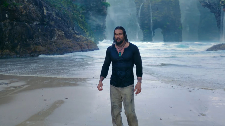 Aquaman standing on beach