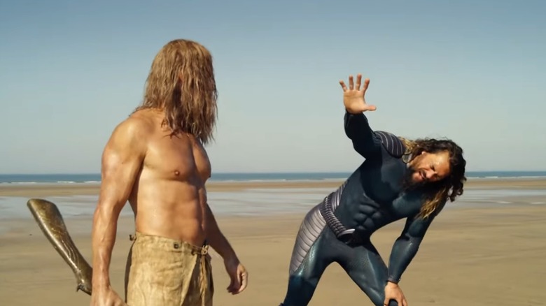 Aquaman and Orm on a beach