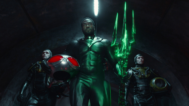 Black Manta holds a trident