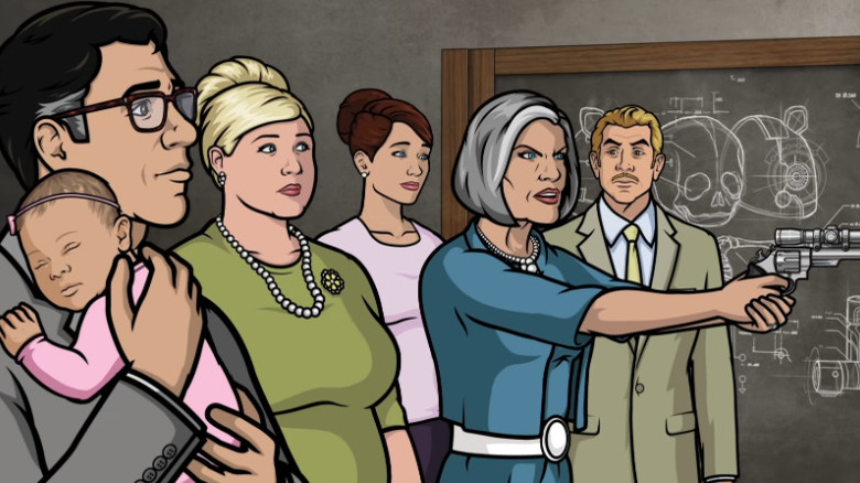 Malory Archer pointing a gun