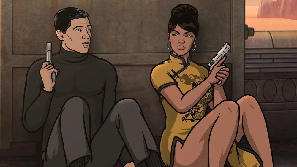 Archer and Lana taking cover with guns drawn