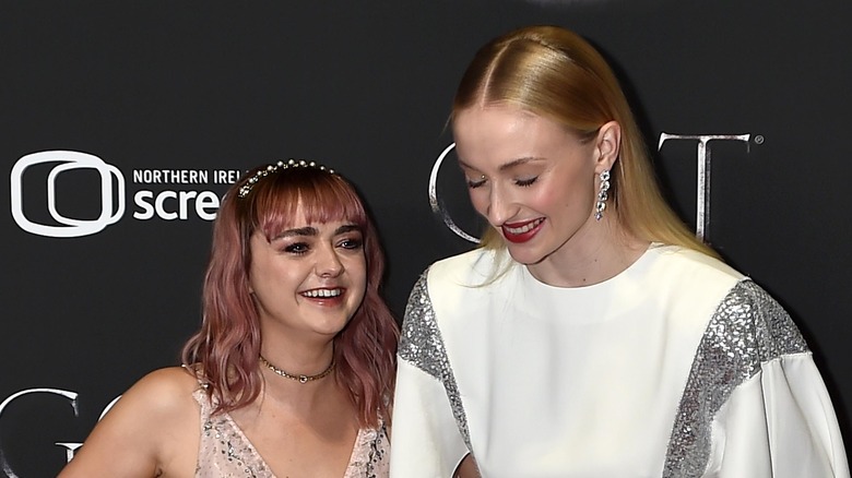 Sophie Turner and Maisie Williams laughing