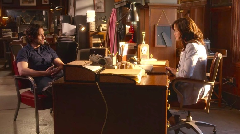 Jess and Rory sit at desk 