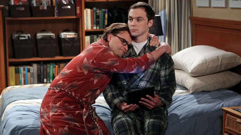 Leonard hugging Sheldon in pajamas