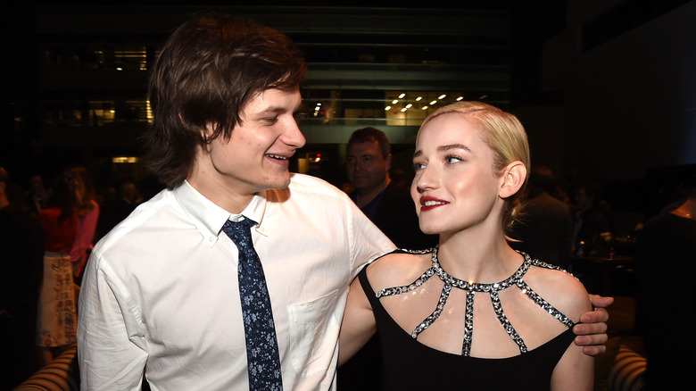 Julia Garner and Charlie Tahan hugging