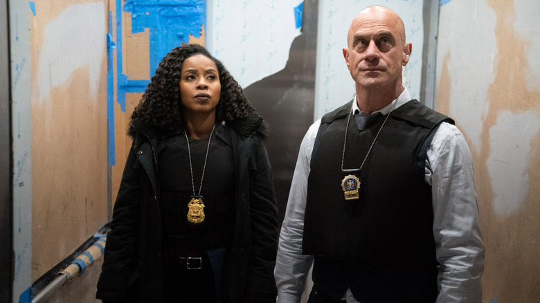 Danielle Moné Truitt and Christopher Meloni wearing badges in Law & Order: Organized Crime