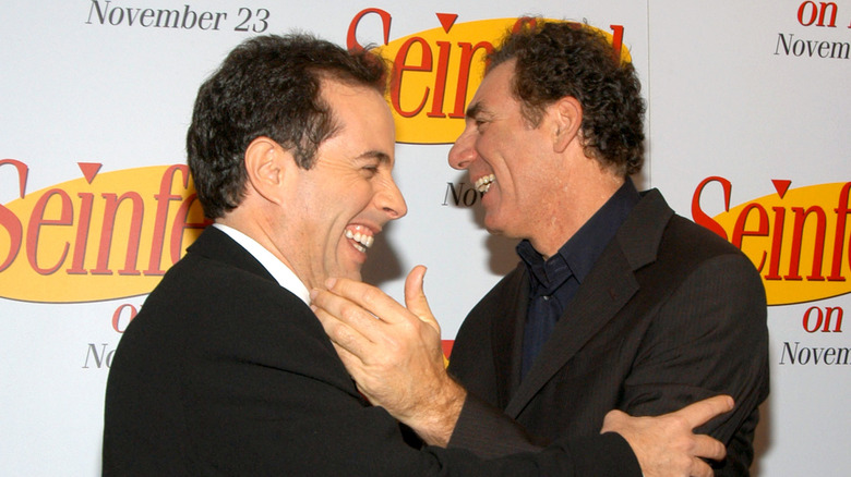 Jerry Seinfeld and Michael Richards laughing.