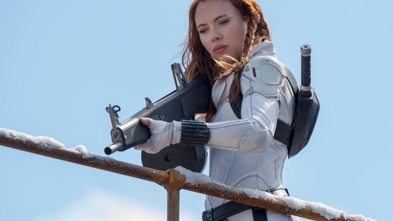 Black Widow aiming a gun