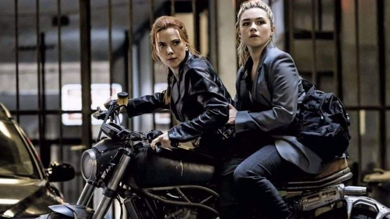 Johansson and Pugh on a motorcycle