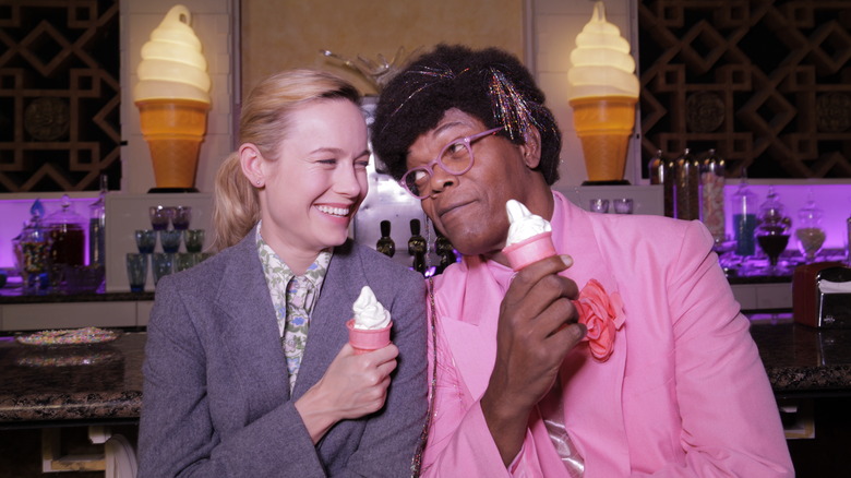 Brie Larson and Samuel L. Jackson posing with ice cream cones