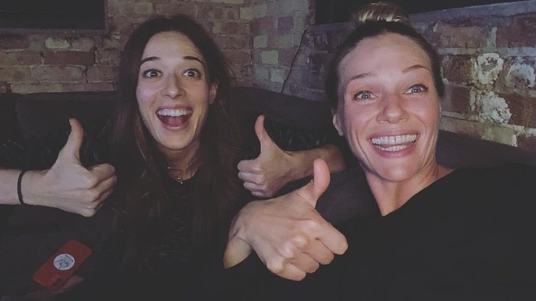 Marina Squerciati and Tracy Spiridakos giving thumbs up