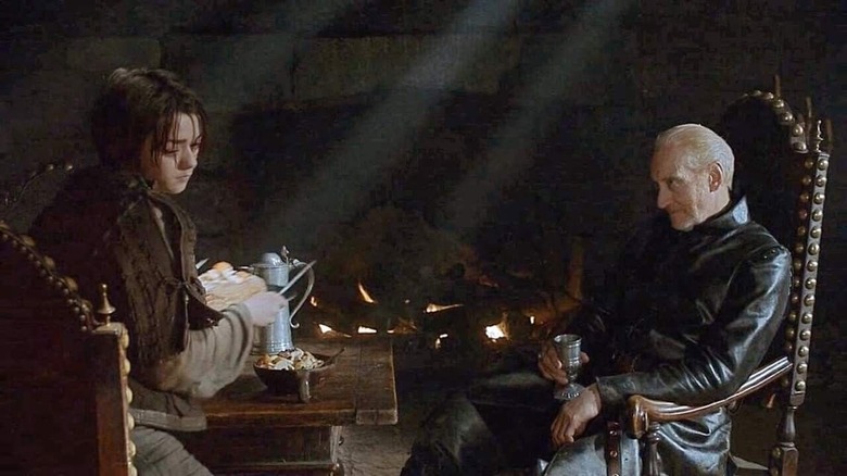 Arya serves Tywin Lannister food