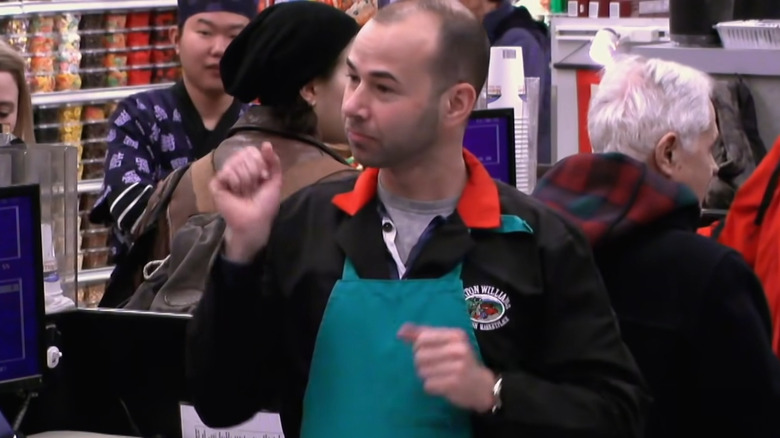 Murr ringing up groceries