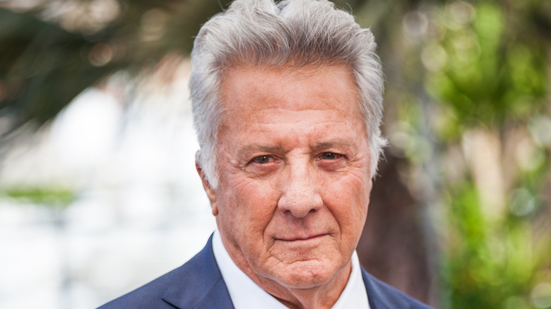 Dustin Hoffman stares at camera