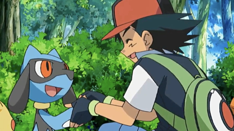 Ash shakes hands with wild Riolu