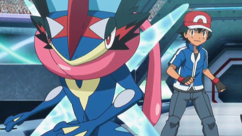 Ash standing behind Ash-Greninja