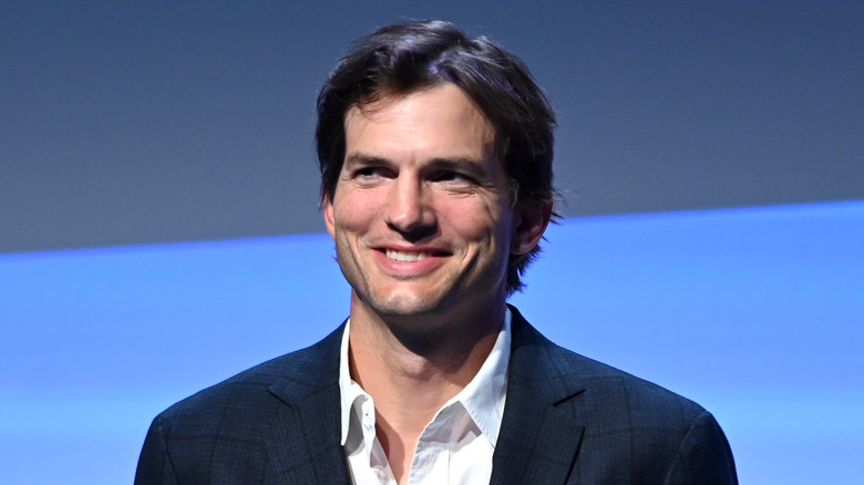 Ashton Kutcher smiles